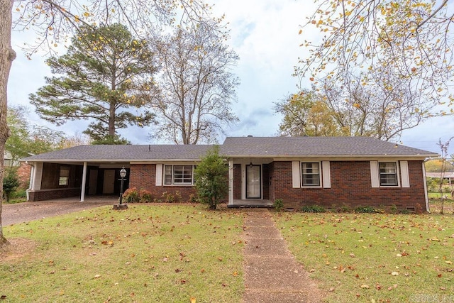 ranch-style house with a front yard and a carport