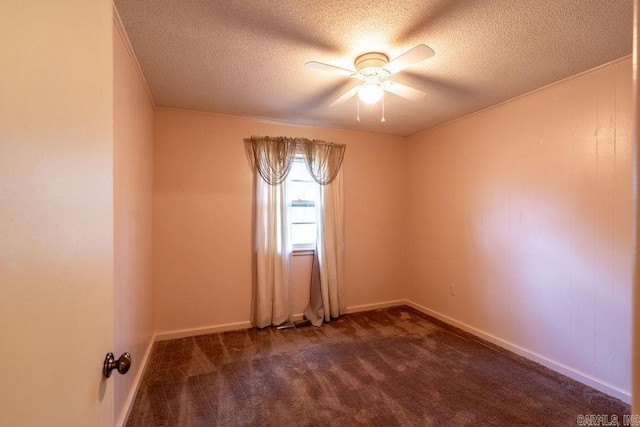 713 N Spring St, Searcy, AR 72143 - unfurnished room with ceiling fan, a textured ceiling, dark carpet, crown molding, and baseboards