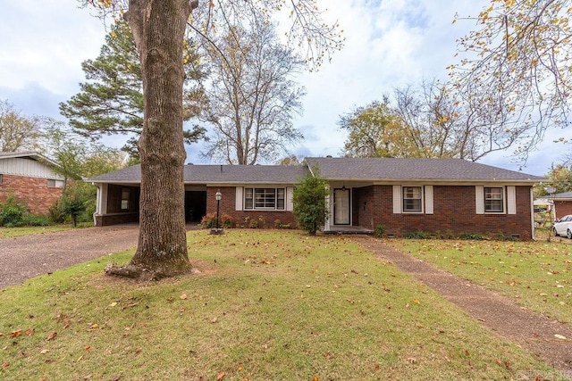 713 N Spring St, Searcy, AR 72143 - ranch-style home with brick siding, driveway, and a front yard