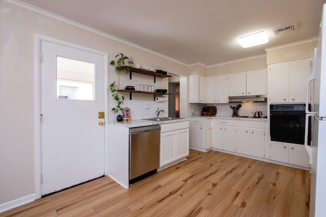 kitchen featuring white cabinetry, tasteful backsplash, stainless steel dishwasher, crown molding, and black oven