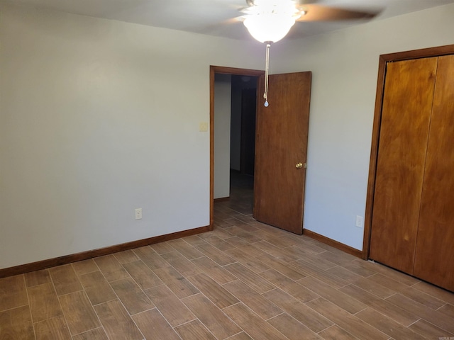 unfurnished bedroom featuring ceiling fan, a closet, and light hardwood / wood-style flooring