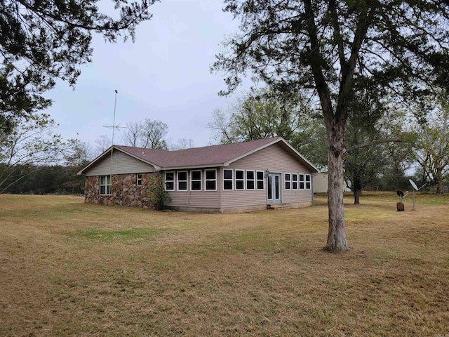 exterior space featuring a yard