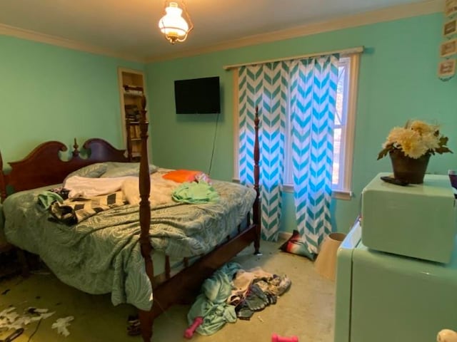 bedroom with ornamental molding