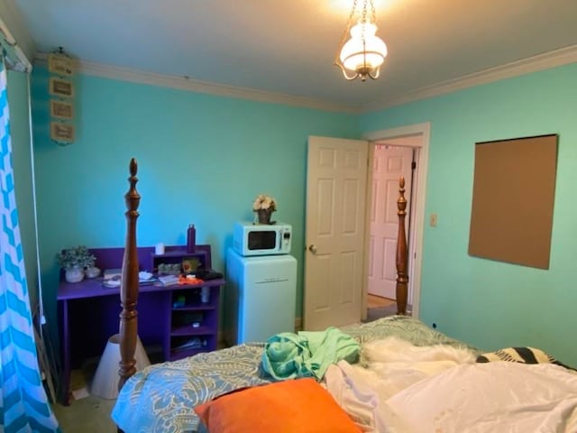 bedroom with crown molding