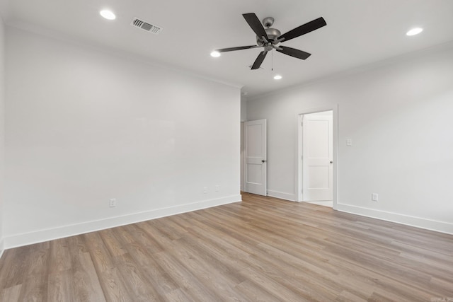 unfurnished room with ceiling fan, crown molding, and light hardwood / wood-style flooring