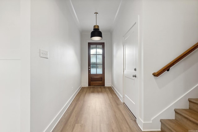 doorway to outside featuring light wood-type flooring