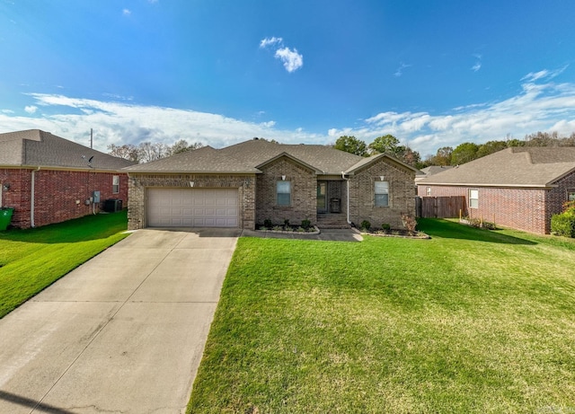 ranch-style house featuring cooling unit, a front yard, and a garage