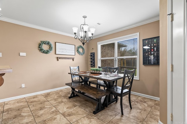 dining area with a chandelier and ornamental molding