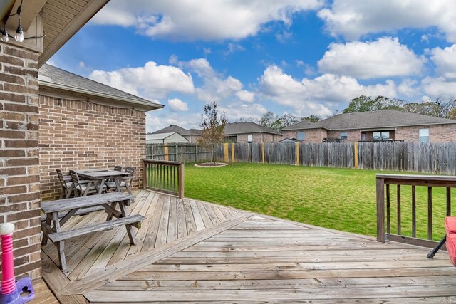 deck featuring a yard