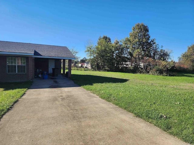 view of yard featuring a carport