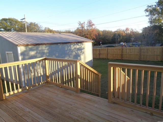 deck featuring a lawn