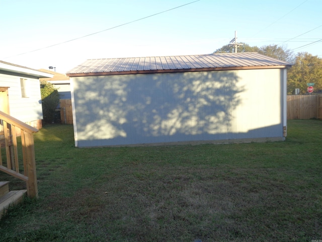 view of property exterior with a lawn