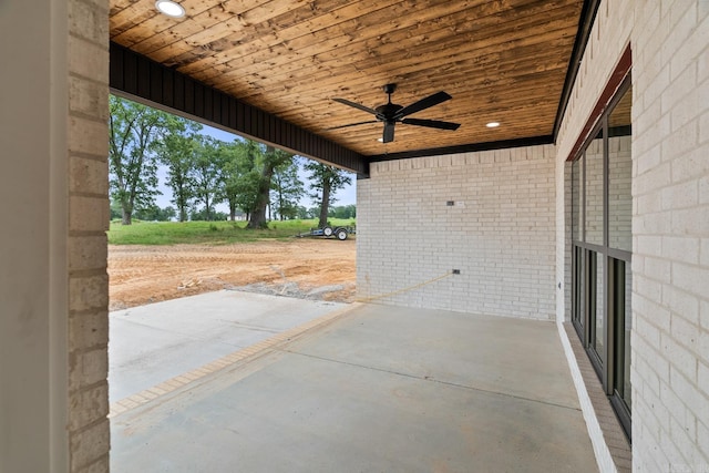 view of patio / terrace featuring ceiling fan