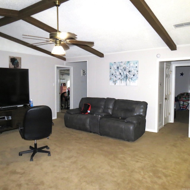 living room featuring ceiling fan, carpet floors, and lofted ceiling with beams