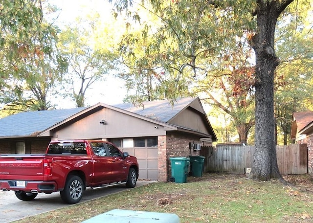 view of property exterior with a garage