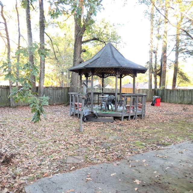 view of yard with a wooden deck