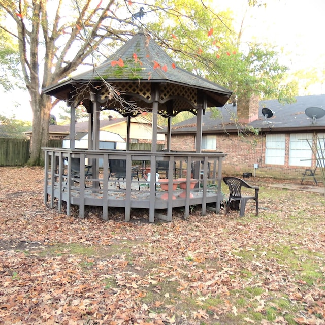 wooden deck with a gazebo