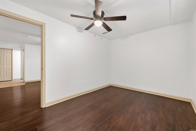 unfurnished room with ceiling fan and dark hardwood / wood-style flooring