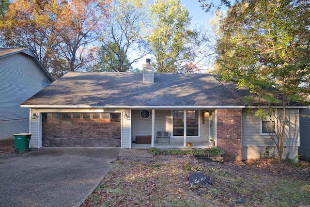 view of front facade featuring a porch and a garage