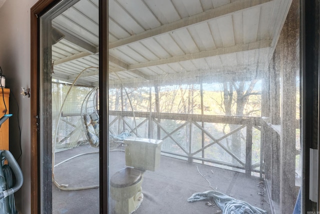 entryway with beam ceiling