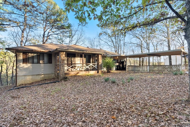 view of front of property with a carport