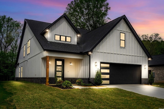 modern inspired farmhouse featuring a yard