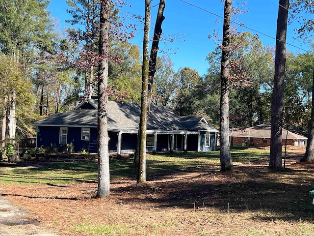 view of home's exterior with a yard