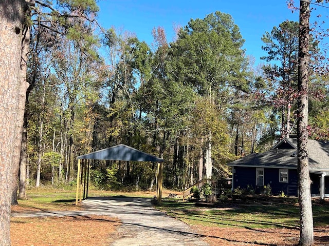 exterior space featuring a carport