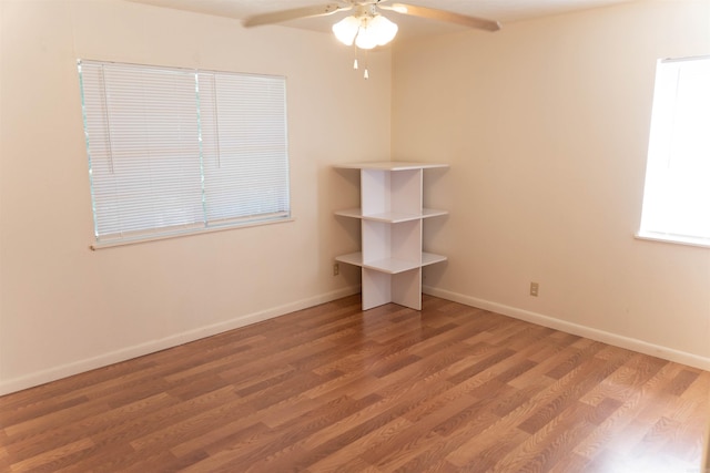 unfurnished bedroom with hardwood / wood-style flooring and ceiling fan