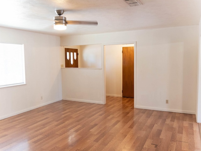 spare room featuring hardwood / wood-style floors