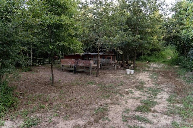 view of yard featuring a wooden deck