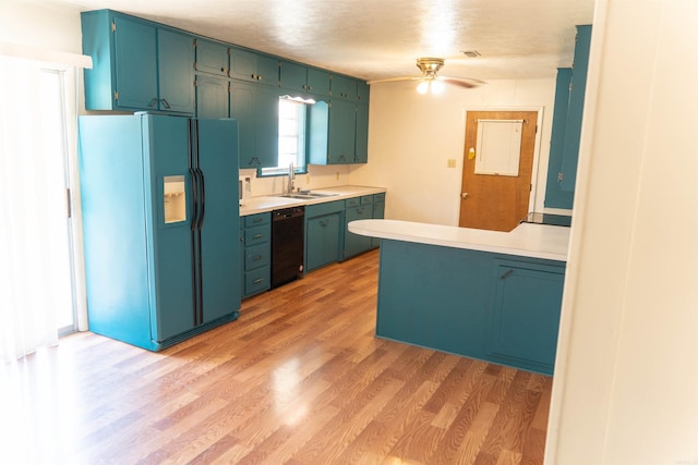 kitchen featuring light wood-type flooring, ceiling fan, sink, fridge with ice dispenser, and dishwasher