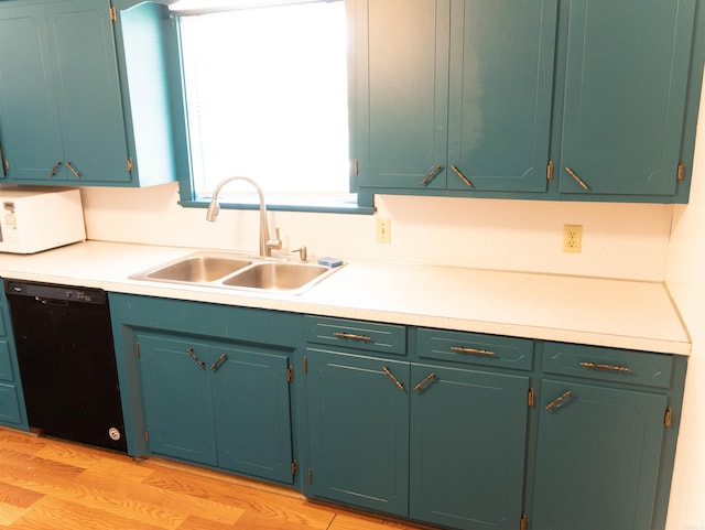 kitchen with dishwasher, light hardwood / wood-style floors, and sink