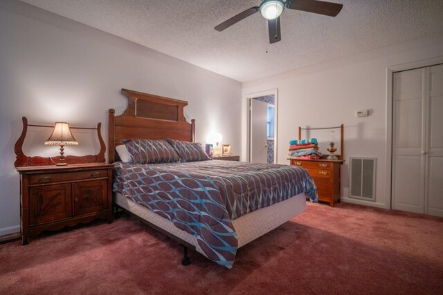 250 Wanda Ln, Heber Springs, AR 72453 - carpeted bedroom featuring ceiling fan, a closet, and a textured ceiling