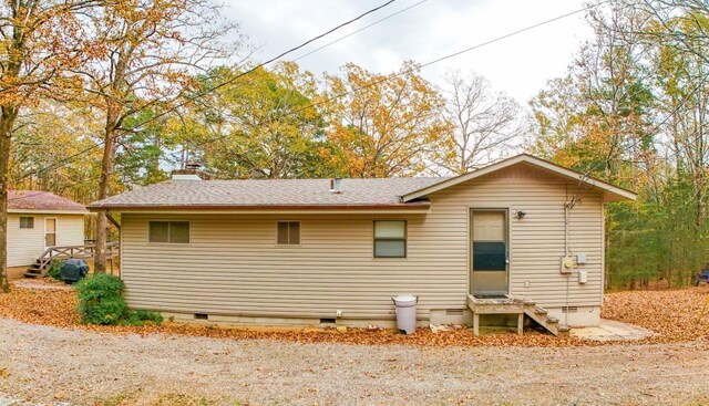 250 Wanda Ln, Heber Springs, AR 72453 - kitchen featuring wooden ceiling, wooden walls, light hardwood / wood-style floors, kitchen peninsula, and a breakfast bar area