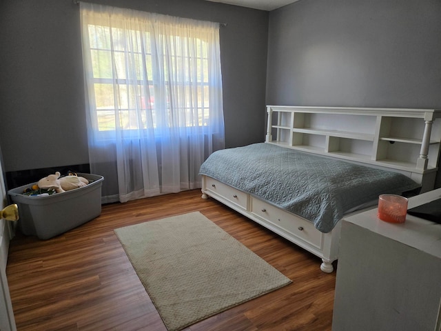 bedroom featuring hardwood / wood-style flooring