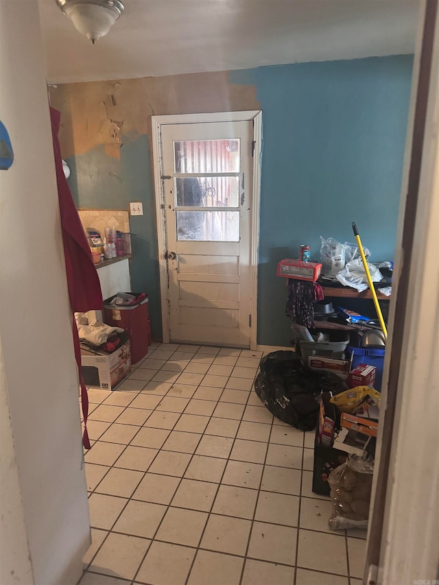 doorway featuring light tile patterned floors