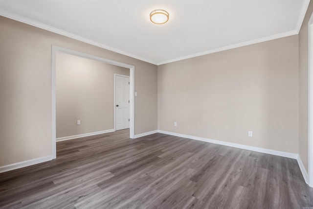 unfurnished room featuring dark hardwood / wood-style floors and ornamental molding