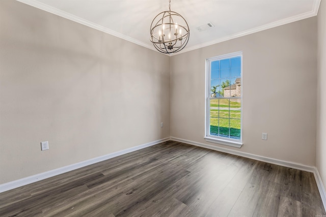 spare room with a chandelier, crown molding, and dark wood-type flooring