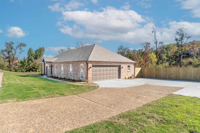 view of side of home featuring a yard and a garage