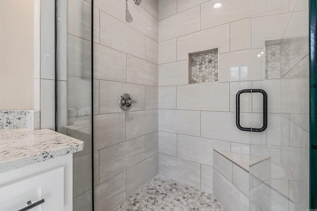 bathroom with an enclosed shower