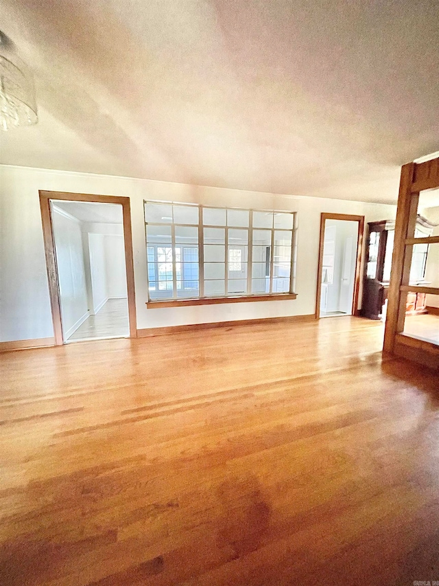 unfurnished living room featuring a textured ceiling