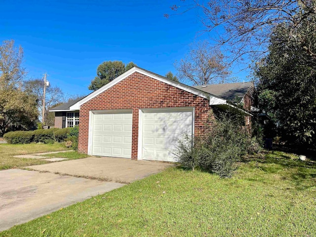 view of side of property with a yard