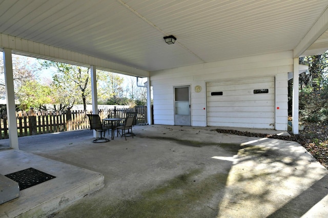 view of patio with a garage