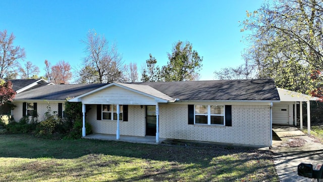 ranch-style house with a front lawn