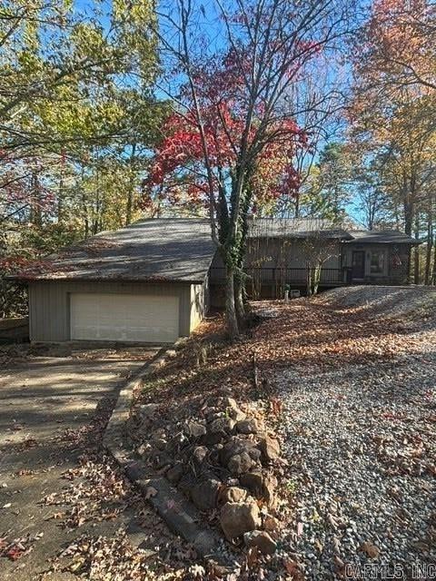 exterior space featuring an outbuilding and a garage