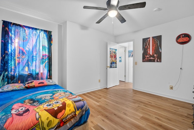 bedroom featuring ceiling fan and light hardwood / wood-style floors