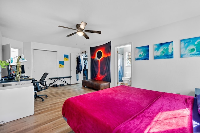 bedroom with ceiling fan, a closet, connected bathroom, and light hardwood / wood-style flooring