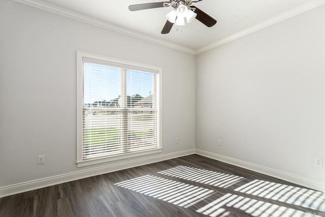 empty room with ceiling fan, dark wood-type flooring, and ornamental molding