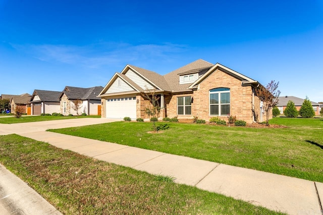 craftsman house featuring a front yard and a garage